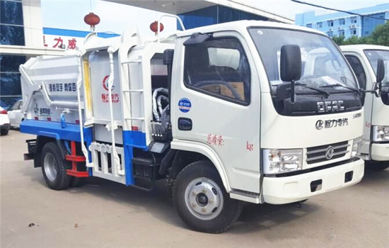 東風(fēng)小多利卡側裝壓縮式對接垃圾車(chē)(5立方)